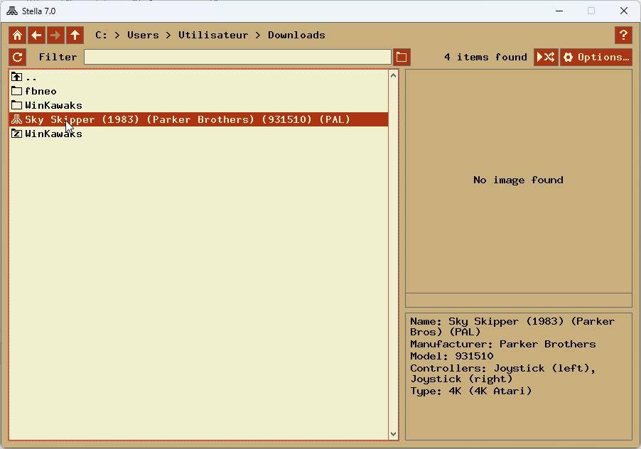 Stella's file list with the zip of Sky Skipper selected, and the panel giving its maker, controllers and cartridge type